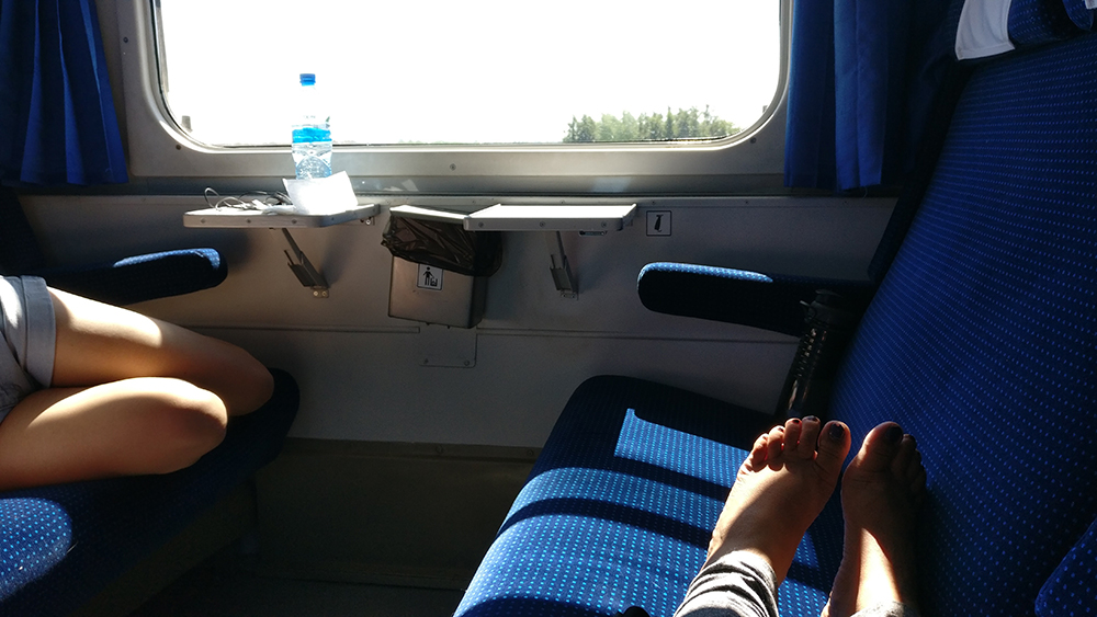 Stretching out in our roomy train cabin